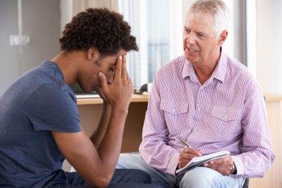 Young Man Having Counselling Session